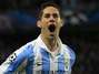 El central del Málaga Francisco Román Alracón "Isco", celebra su gol, primero del equipo, ante el Oporto durante el partido de vuelta de octavos de final de la Liga de Campeones que se disputa esta noche en el estadio de La Rosaleda en Málaga Foto: EFE