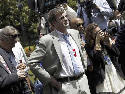 Neil Munro periodista conservador del Daily Caller, escucha al presidente Barack Obama, luego de increparlo por la aprobación de una medida que impediría la deportación de jóvenes inmigrantes, el viernes 15 de junio de 2012, en la Casa Blanca  Foto: Haraz N. Ghanbari / AP