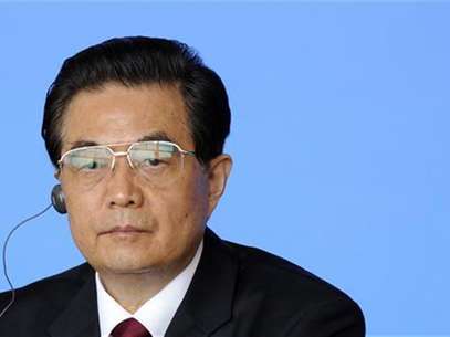 China's President Hu Jintao attends a joint news conference with other world leaders during the BRICS summit in Sanya, on the southern Chinese island of Hainan, April 14, 2011. Foto: Pool / Reuters In English