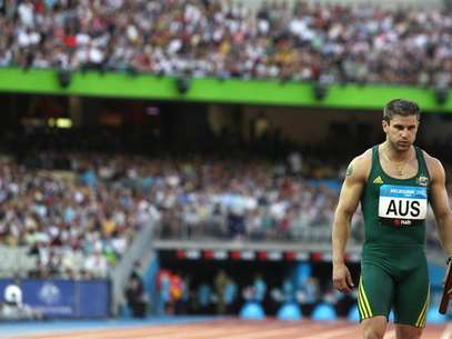 Australia's Daniel Batman competes in the men's 4x100 relay final at the Commonwealth Games in Melbourne March 25, 2006. Foto: Luis Enrique Ascui / Reuters In English