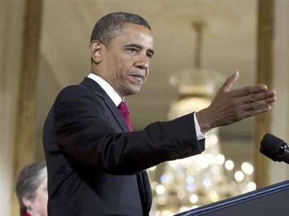 U.S. President Barack Obama speaks during a naturalization ceremony for active duty service members in the East Room of the White House in Washington July 4, 2012. Foto: Joshua Roberts / Reuters In English