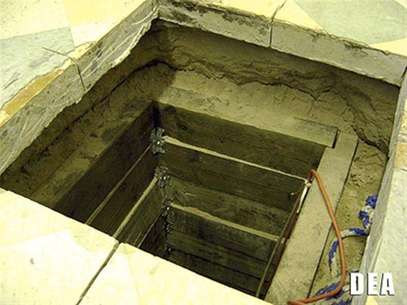 The US entryway of a cross border tunnel is pictured in this undated handout photo taken by the DEA in San Luis, Arizona. Foto: Handout / Reuters In English