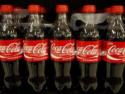 Bottles of Coca-Cola are seen in a warehouse at the Swire Coca-Cola facility in Draper, Utah in this March 9, 2011, file. Coca-Cola Co reported a higher-than-expected second quarter profit as rising consumption of its drinks in emerging markets offset declines in Europe. Foto: Files / Reuters In English