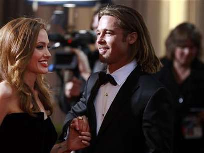 Actress and presenter Angelina Jolie and her partner actor Brad Pitt arrive at the 84th Academy Awards in Hollywood, California, February 26, 2012. Foto: Lucas Jackson / Reuters In English