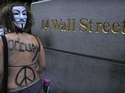 An Occupy Wall Street activist takes part in a march in downtown Manhattan in New York July 11, 2012. Foto: Eduardo Munoz / Reuters In English