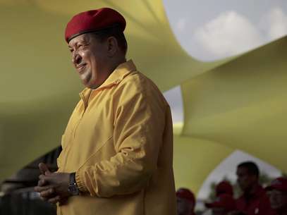 El presidente de Venezuela, Hugo Chávez, sonríe en esta fotografía de archivo del 14 de julio de 2012 durante una reunión proselitista en Barquisimeto, Venezuela.  Foto: Ariana Cubillos, Archivo / AP