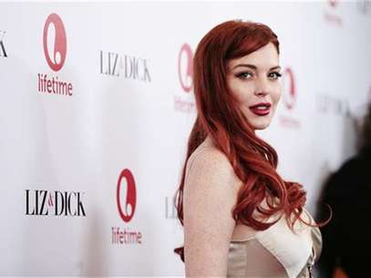 Actress Lindsay Lohan arrives for a private dinner celebrating the upcoming premiere of "Liz & Dick" at the Beverly Hills Hotel in Beverly Hills, California November 20, 2012. "Liz & Dick" is a television film starring Lohan as actress Elizabeth Taylor. Foto: Jason Redmond / Reuters