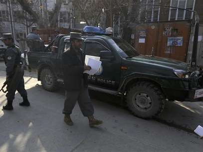 U.S. security personnel escorts a U.S. convoy to Kabul police headquarters in Kabul December 24, 2012. Foto: Mohammad Ismail / Reuters