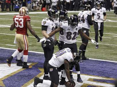 Baltimore Ravens wide receiver Anquan Boldin celebrates his touchdown with teammates Torrey Smith (82), and Dennis Pitta (88) against the San Francisco 49ers during the first quarter in the NFL Super Bowl XLVII football game in New Orleans, Louisiana, February 3, 2013. Foto: Jim Young / Reuters