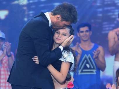 Marcelo junto a su hija Juanita, los Tinelli que sufrieron la furia de las Directioners. Foto: Web.