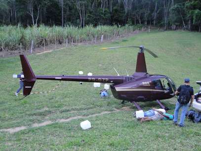 Helicóptero que pertence à empresa do deputado mineiro Gustavo Perrella foi apreendido com mais de 400 quilos de cocaína no Espírito Santo Foto: Polícia Militar do ES / Divulgação