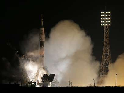 O foguete foi lançado na última terça-feira, 25, com dois russos e um americano a bordo Foto: Reuters