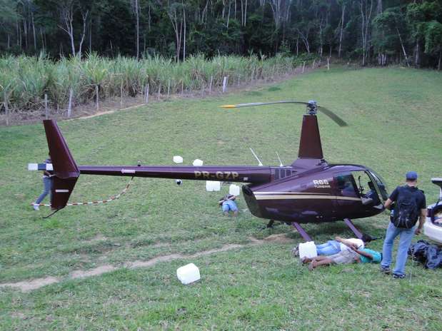 Helicóptero que pertence à empresa do deputado mineiro Gustavo Perrella foi apreendido com mais de 400 quilos de cocaína no Espírito Santo Foto: Polícia Militar do ES / Divulgação