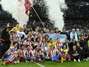 Atletico Madrid holds off Real 2-1 for Copa title (photos)