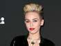 Photos: Miley Cyrus rocks red lips & abs @ Myspace party