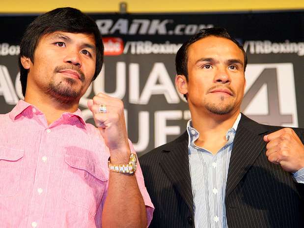 El mexicano Juan Manuel Márquez y el filipino Manny Pacquiao iniciaron la gira promocional de su cuarto combate del próximo 8 de diciembre en un hotel de Los Ángeles, Estados Unidos. Dicho combate que se realizará en el MGM Grand de Las Vegas. Foto: Getty Images