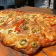 Você já ouviu falar em porco pizza? Conheça essa iguaria, que surgiu no Sul do Brasil