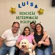 Triatleta Luisa Baptista volta para casa após alta e é recebida com festa: 'Muito grata'