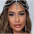 Detonada por pastor após batismo em igreja evangélica, Simone Mendes canta hit de Anitta em show e provoca: 'Sei que tu me odeia'
