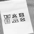 Qual o poder da etiqueta na peça de roupa e por que não removê-la é o caminho certo?