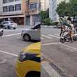 Lutador usa moto para ajudar idoso a atravessar rua no Rio de Janeiro