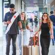 Viviane Araujo é flagrada com o marido em aeroporto após gravações de 'Três Graças' com Belo