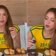 Com a camisa do Brasil, Shakira prova pão de queijo, coxinha e brigadeiro; veja a reação dela