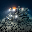 Os robôs submarinos blindados que estão a varrer o fundo do oceano pacífico em busca das pedras negras que vão alimentar os veículos do futuro
