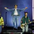 Jonas Brothers em SP: Joe Jonas usa jaqueta escrita "O HEXA VEM"