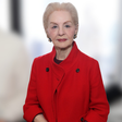 Carolina Herrera sabe o segredo: como dar um toque especial a qualquer look com saia midi ou calça larga neste Outono-Inverno