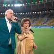 Belo mostra bom humor e brinca em show com críticas pelo Hino Nacional