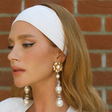 Marina Ruy Barbosa prova elegância do look todo branco com vestido de R$ 3,9 mil para Wimbledon