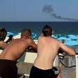 O balneário de luxo na Ucrânia em que turistas em praias lotadas convivem com o perigo constante de bombas e mísseis