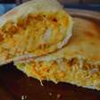 Calzone de frango para preparar de forma rápida e garantir um lanche bem saboroso para a família
