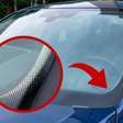 Nem para decoração nem para descansar a vista: essa é a verdadeira função dos pontinhos ao longo da borda do para-brisa do carro