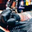 Trabalhar sete dias por semana nesta startup de IA não era comprometimento suficiente; eles também exigiam uma tatuagem obrigatória