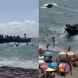 Embarcação chega com dezenas de imigrantes e surpreende banhistas em praia na Espanha