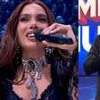 Anitta corrige Luciano Huck ao vivo no 'Domingão': 'Vai me interromper?'