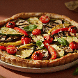 Quer um jantar com vegetais? Aprenda a fazer esta quiche de abobrinha, berinjela e pimentão