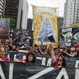 Cartazes religiosos e imagens de Nossa Senhora marcam manifestação pró-Lula em SP