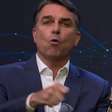Flávio Bolsonaro faz cola na mão com a palavra 'corrupto' no debate e provoca Lula