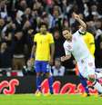 <p>Na volta de Felipão, Brasil perdeu para a Inglaterra com gols de Rooney e Lampard (foto)</p>  Foto: AFP