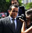 Acusado de matar o pai e a madrasta, o ex-seminarista Gil Rugai chega para o início de seu julgamento  Foto: Fernando Borges / Terra