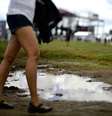 <p>Chuva da madrugada deixou gramado do Jockey Club cheio de poças de lama</p>  Foto: Fernando Borges / Terra