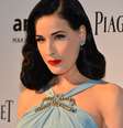 <p>Dita Von Teese é famosa por seu estilo pin-up</p>  Foto: Getty Images