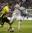 <p>Real e Borussia fizeram jogo agitado e emocionante em Madri</p>  Foto: Reuters