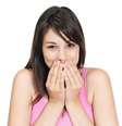 Em quase 90% dos casos, a halitose tem origem bucal  Foto: Shutterstock
