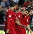 Jogadores de Portugal comemoram gol de Postiga contra a Rússia  Foto: Reuters