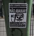 Cartaz colado em uma lixeira no centro de São Paulo convoca pessoas ao protesto de terça-feira  Foto: J. Duran Machfee / Futura Press