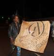 <p>Na faixa desses manifestantes de Belo Horizonte, o símbolo do anarquismo</p>  Foto: Diego Garcia / Terra